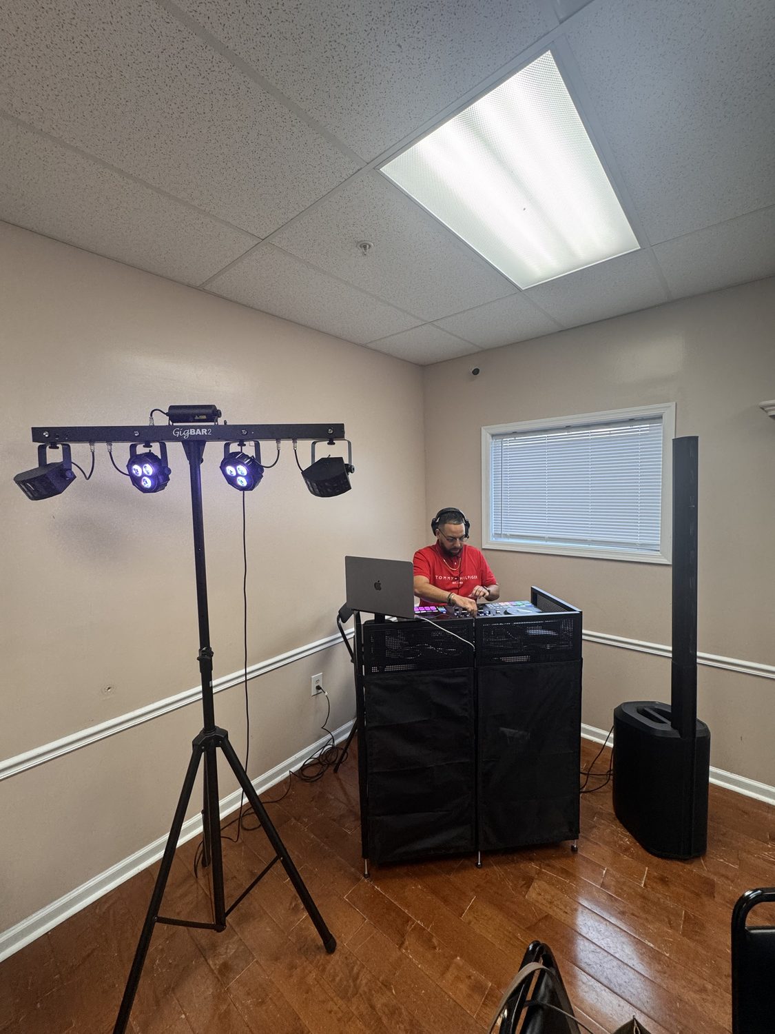 DJ booth and speaker setup at a celebration