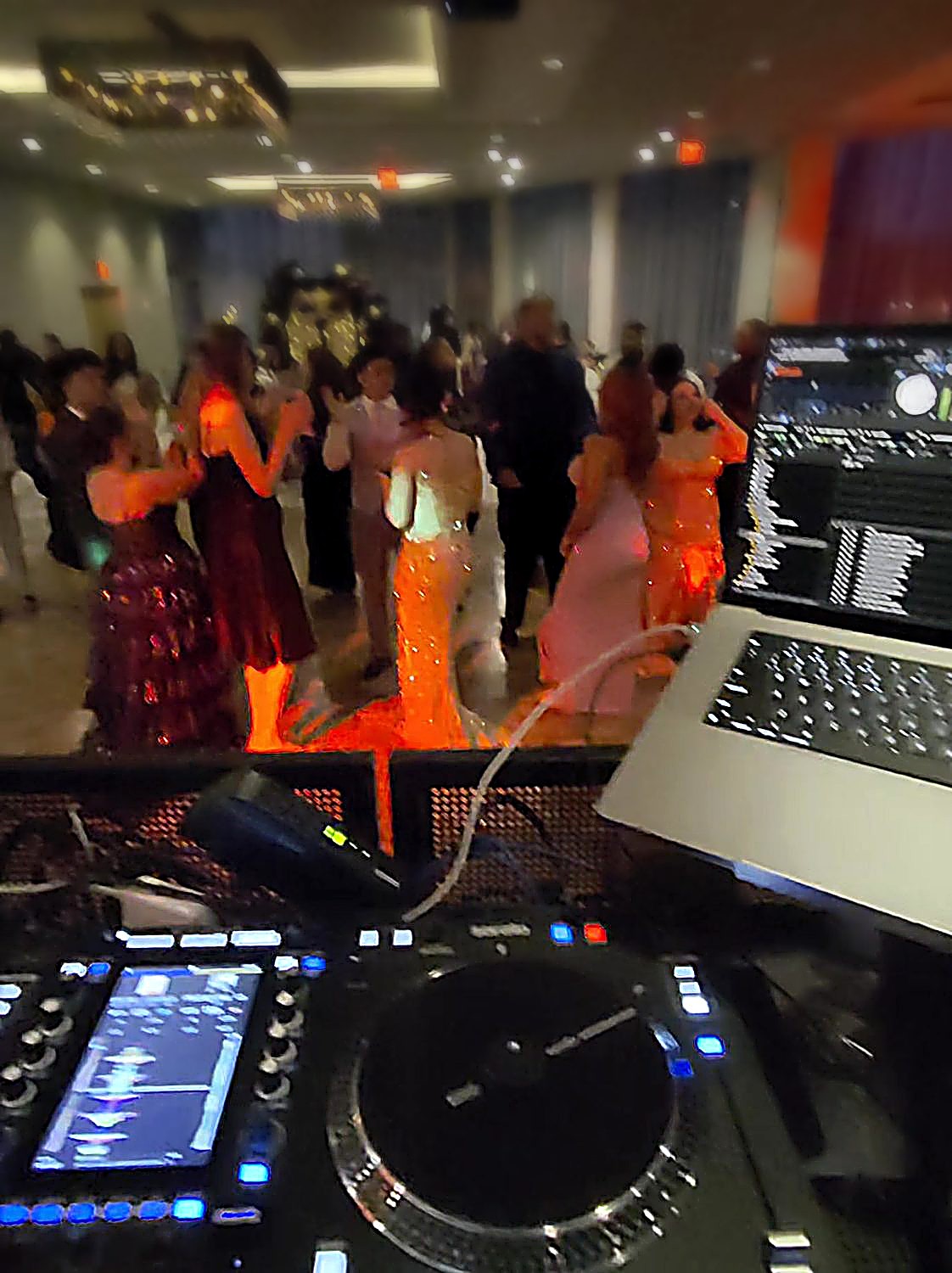 Packed prom dance floor from the DJ booth