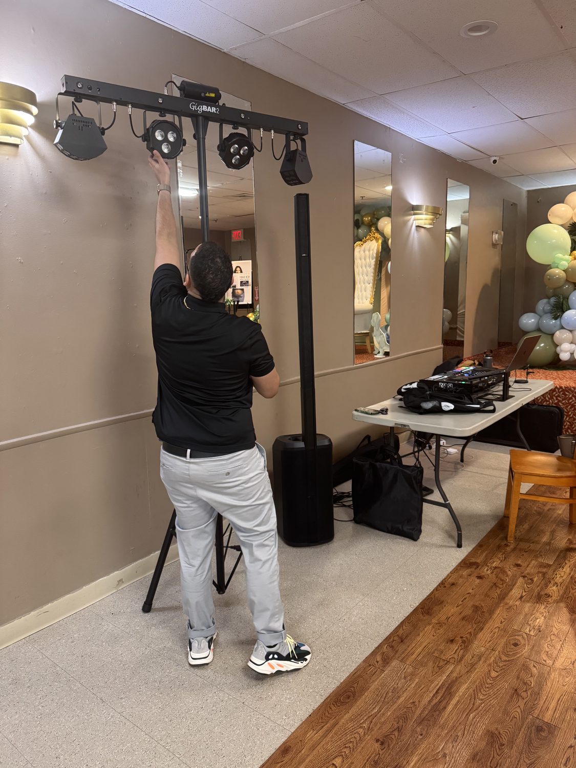 DJ LevSev setting up the lighting rig